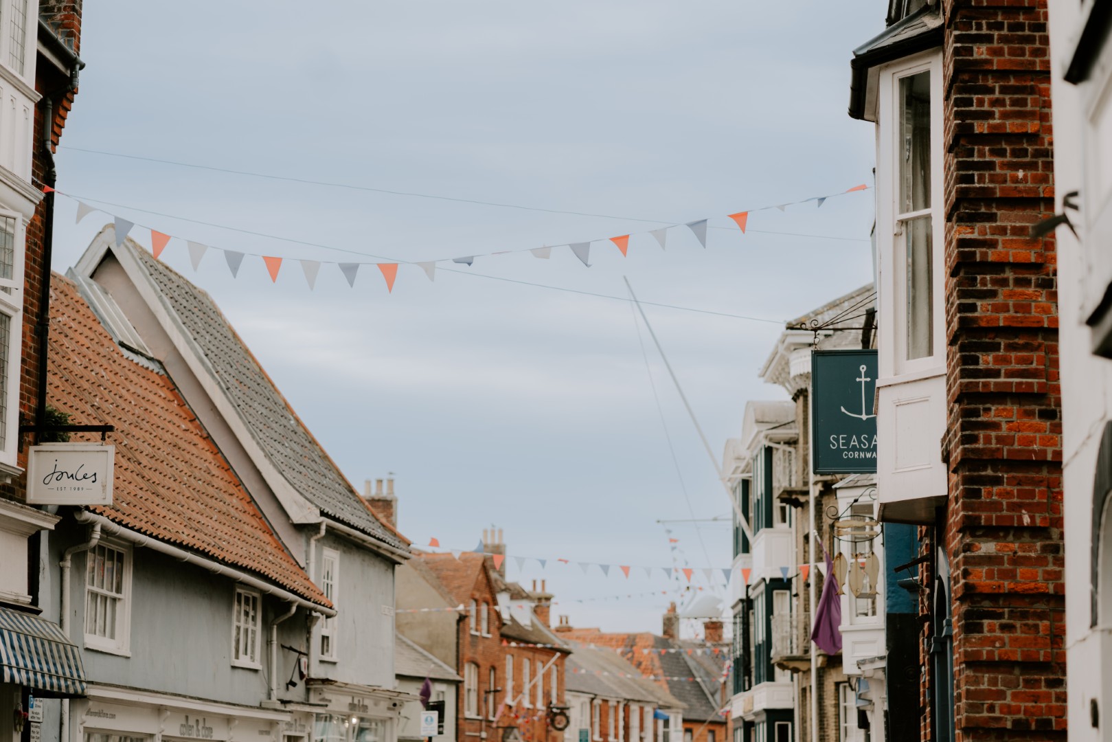Southwold town lined with shops. 